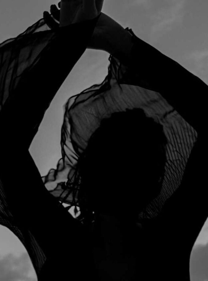 <img src=“Mariam lobzhanidze's photo absence” alt=“woman in motion in black and white” title=“black and white”