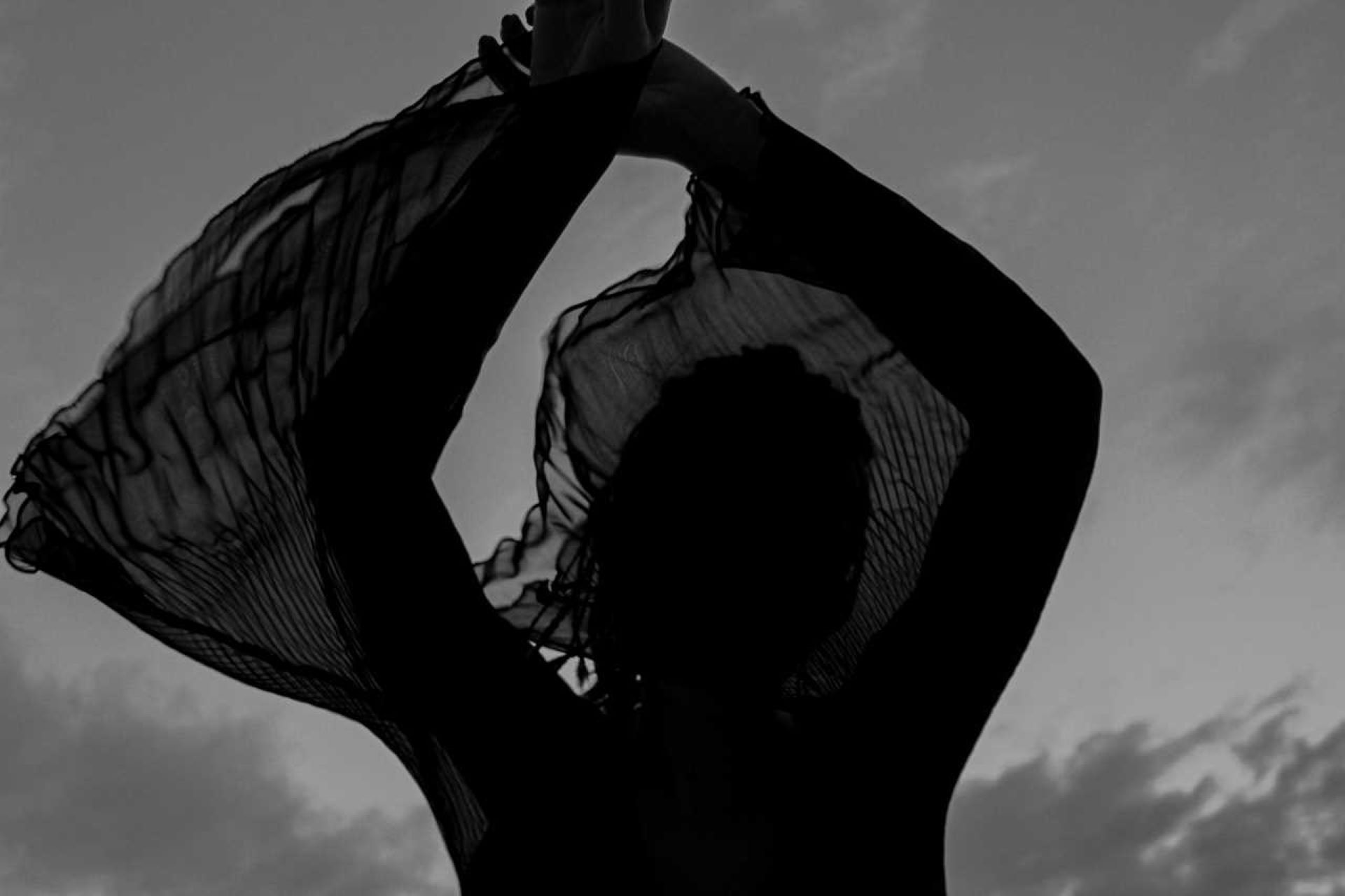 <img src=“Mariam lobzhanidze's photo absence” alt=“woman in motion in black and white” title=“black and white”