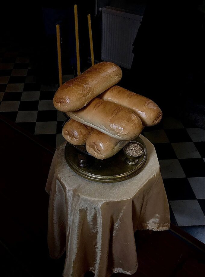 <img src=“Gigi Shukakidze's photo bread” alt=“breads in the chapel” title=“puri”