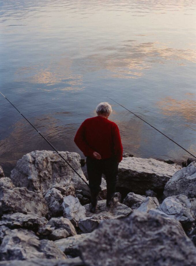 <img src=“Nick Ergemlidze Tsiteli” alt=“Red semi-sweet” title=“Man standing by the lake”